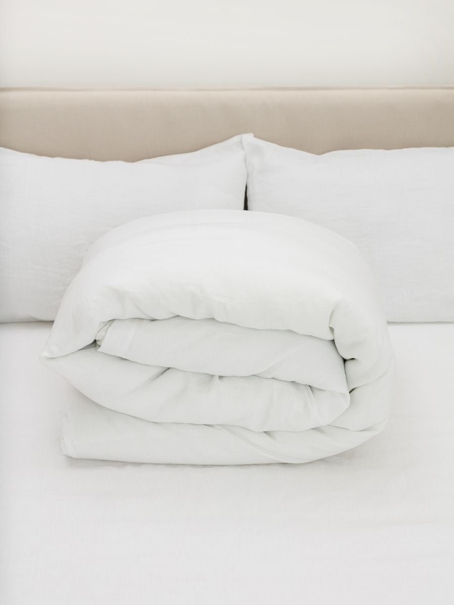 100% flax linen Magnolia White duvet cover rolled neatly – OEKO-TEX Standard 100, easy storage