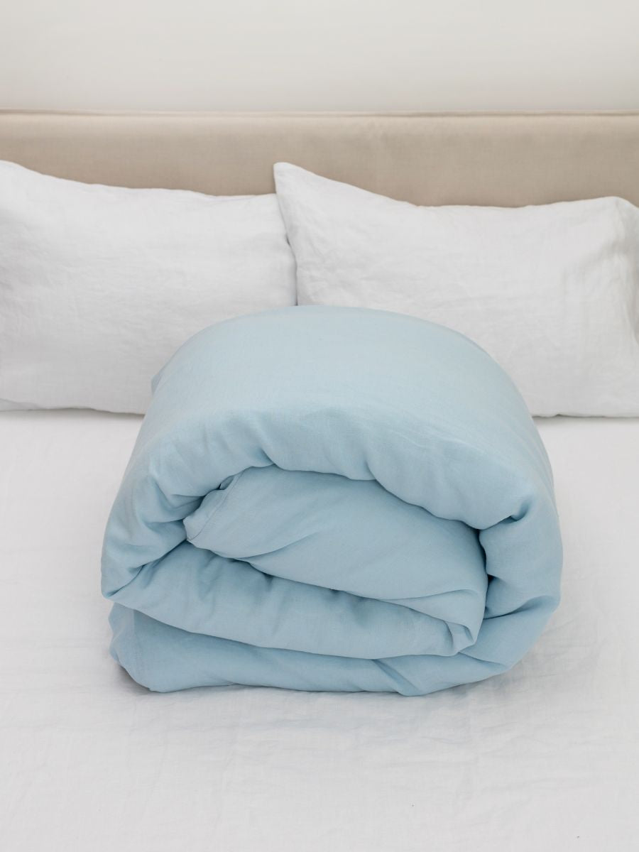 100% flax linen Sky Blue duvet cover rolled neatly – OEKO-TEX Standard 100, easy storage