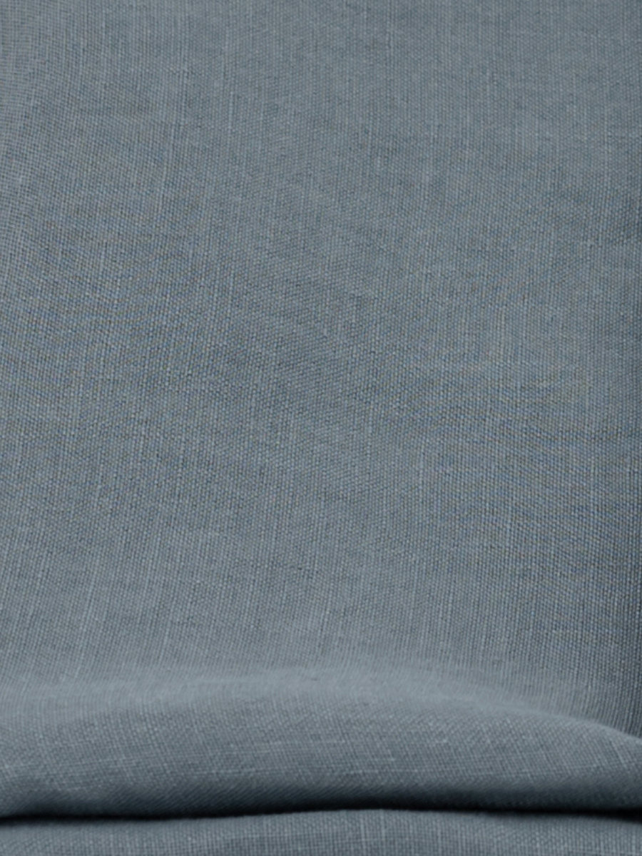 Close-up of Harbor Blue textured fabric with soft linen weave