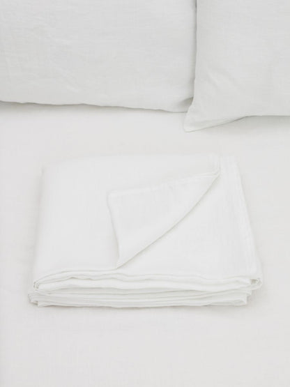 100% flax linen Magnolia White flat sheet folded with corner turned – crisp, luxurious feel