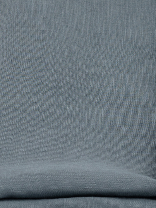 Close-up of Harbor Blue textured fabric with soft linen weave